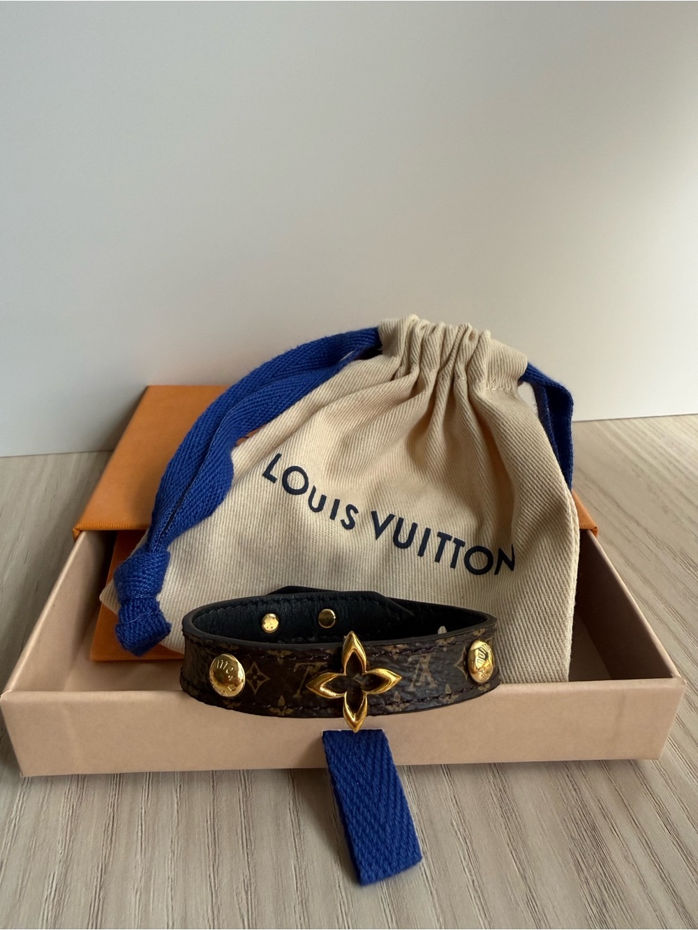 Louis Vuitton Brown Monogram Leather Bracelet with Gold Motif